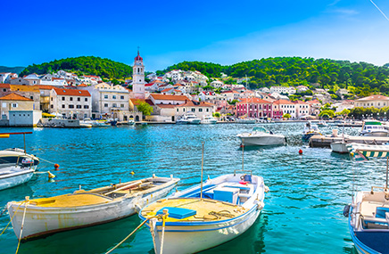 small fishing boats docked in the port